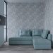 Comfortable sofa with cushions placed near wall with wallpaper and bedroom with glass wall and bed in modern flat with TV